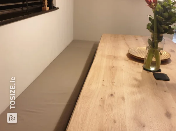 Practical, long custom-made dining room sofa, by Astrid